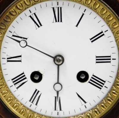 An Edwardian mahogany lancet cased mantel clock, circular enamel dial bearing Roman numerals, eight day movement with bell strike, the case with paterae and line inlay, raised on brass columns, and a rectangular base, on brass ball feet, with pendulum and - 2