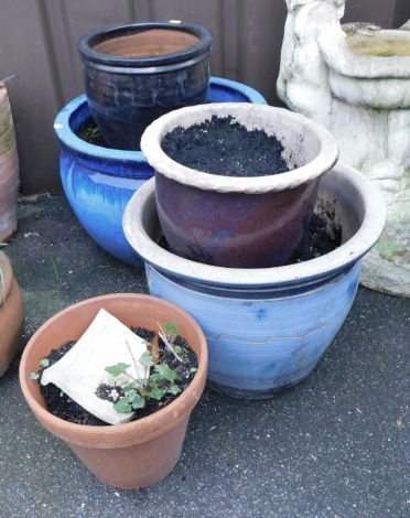 A group of garden pots, terracotta, a blue glazed example, 43cm diameter, etc. (a quantity)