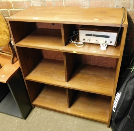 A teak open bookcase, together with a Rogers stereo tuner.