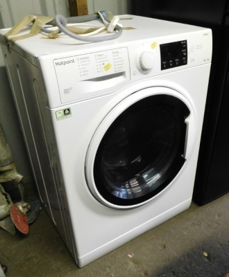 A Hotpoint 8kg washing machine.