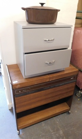 A Philips hostess trolley, together with a Le Creuset brown cast iron casserole pot and cover, and a two drawer filing cabinet. (3)