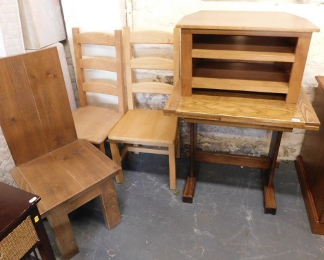 Two ladderback chairs, small oak draw leaf dining table, 78cm high, 81cm wide, 71cm deep, a small TV unit with two shelves, and another solid seated chair.