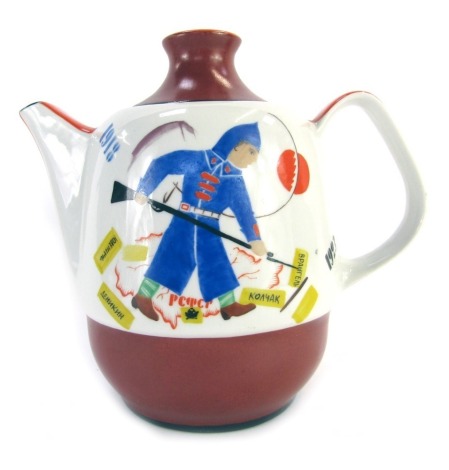 An early 20thC Russian propaganda porcelain teapot, depicting a scene commemorating the end of the Russian Civil War, the front painted with a Bolshevik holding gun standing above map with the dates 1918-1923 verso painted with a depiction of a farm labou