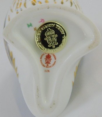 A Royal Crown Derby porcelain paperweight modelled as a puffin, gold stopper and red printed marks, 12cm high, boxed. - 2