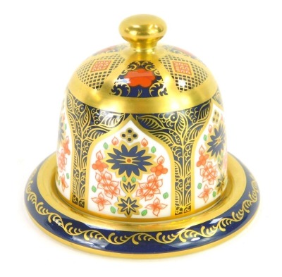 A Royal Crown Derby Old Imari porcelain match holder and striker, gold ground, pattern 1128, red printed marks, 7cm high, boxed.