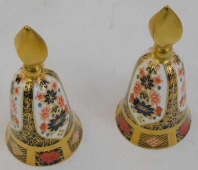 Two Royal Crown Derby Old Imari porcelain candle snuffers, gold ground, pattern 1128, red printed marks, 12cm high, both boxed. - 2