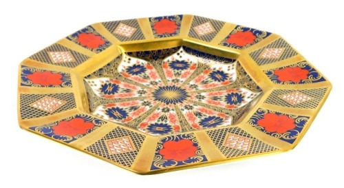 A Royal Crown Derby Old Imari porcelain plate, of octagonal form, gold ground, pattern 1128, boxed, 22.5cm wide.