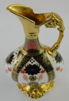 A Royal Crown Derby Old Imari porcelain ewer, pattern 1128, red printed marks, 26cm high, boxed. - 2