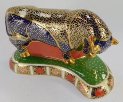 A Royal Crown Derby porcelain paperweight, modelled as a bull, gold stopper and red printed marks, 14cm high, 20cm wide, boxed. - 2