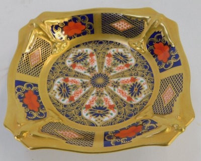 A Royal Crown Derby Old Imari porcelain pedestal sweetmeat dish, gold ground, of square shaped form, pattern 1128, a 1996 Exclusive for The Royal Crown Derby Collectors Guild, red printed marks, 14cm wide, boxed. - 2