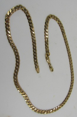 A flat curb link neck chain, yellow metal, stamped 375, 49cm long, 21g. - 2