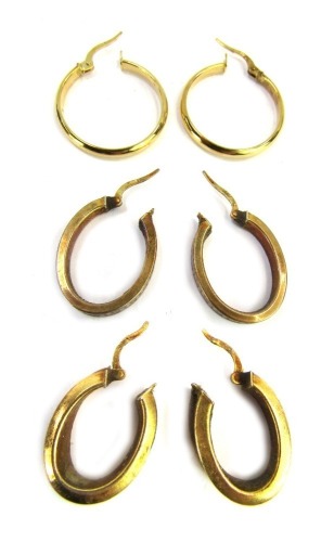 Three pairs of hoop earrings, each yellow metal, stamped 375, one with Greek key style design, the other of brushed finish, 6.6g all in. (3)