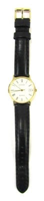 A Tissot gentleman's wristwatch, the cream Roman numeric dial with date aperture, in yellow metal case stamped 375 with import marks, 3cm wide, on a black leather strap, 25.4g all in.