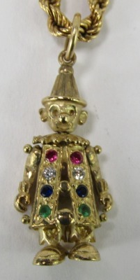 A 9ct gold clown pendant and chain, the clown set with semi precious stones, to include ruby, white stones, emerald and sapphire, stamped 375, 3cm high, on a 9ct gold rope twist neck chain, 40cm long, 16.2g. - 2