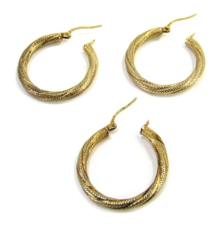 Three 9ct gold bi-colour hoop earrings, 2.5cm wide, 2.6g.