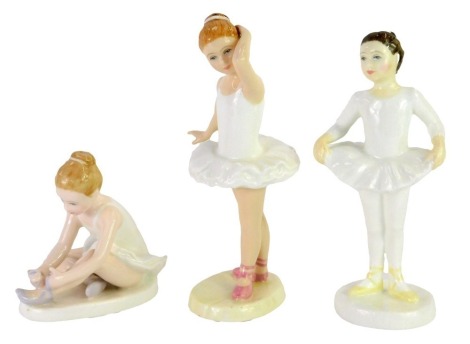 Three Royal Doulton porcelain ballerina figures, comprising Ballet Shoes HN3434 and Little Ballerina HN3395, Ballet Class HN3731, both boxed.