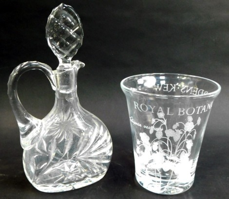 A Royal Botanical Gardens Kew glass vase, of cylindrical tapering form, etched decoration depicting flowering strawberry plants, 16cm high, together with a cut glass ewer and stopper, 29cm high. (2)