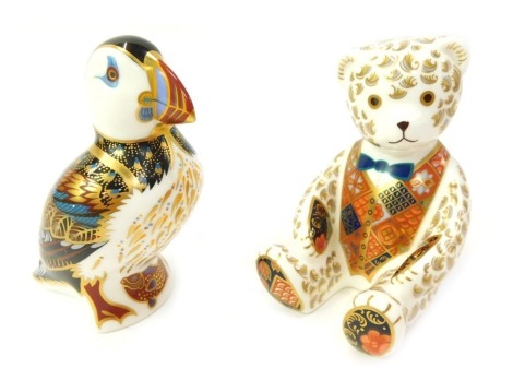 Two Royal Crown Derby porcelain Imari paperweights, modelled as a Puffin and a seated Teddy Bear, silver stoppers, red printed marks, both 12cm high. (2)