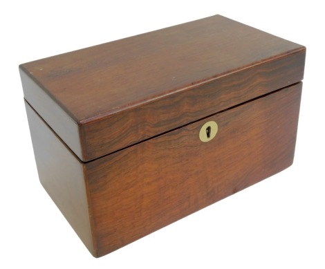 A George III rosewood tea caddy, of rectangular form, the hinged lid enclosing lidded compartment for tea, beside later glass mixing bowl, 23cm wide.