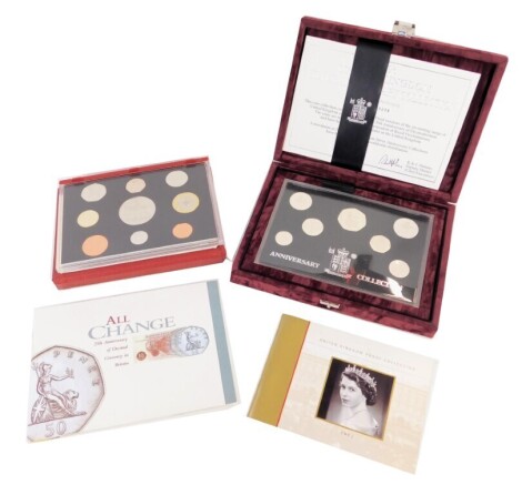 A Royal Mint Silver Anniversary collection anniversary coin pack for 1996, with certificate of authenticity number 13238, and a United Kingdom proof collection set for 2002. (2)