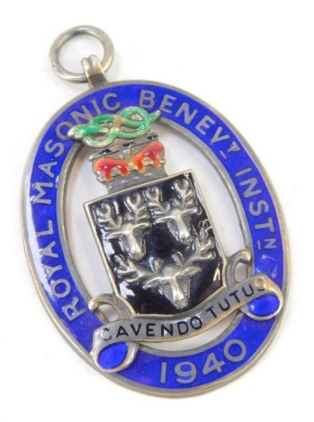 A silver Royal Masonic Benevolent Institution pendant, with blue, black, green and red enamel decoration, dated 1940, 5.5cm high, 16g all in.