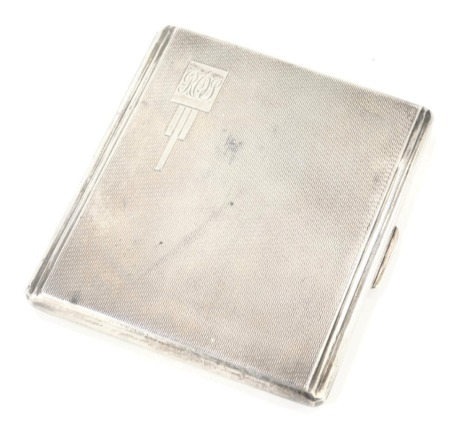 A George VI silver cigarette case, of rectangular form with engine turned decoration bearing the initials RAJ, internal inscription Presented to Mr RO Smith With Compliments of Cambois Colliery 28th October 1950, maker AW, Birmingham 1946, 4.21oz.