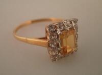 A citrine and diamond ring