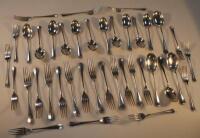 A quantity of George V silver rat-tail cutlery