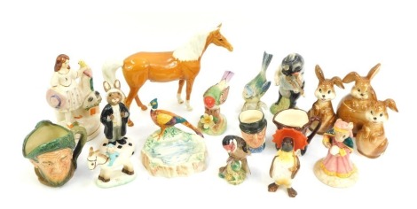 Beswick, Wade and other animals, to include a Beswick Palamino horse, Beswick ware Daniel musical pig, various birds, Bunnykins Fortune Teller, small Old Mac character jug, Beswick penguin, Victorian flat back figure, etc. (1 tray)