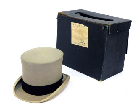 A Lock and Co Hatters grey top hat, internal measurements 16cm x 20cm, in carry case for Henry Heath.