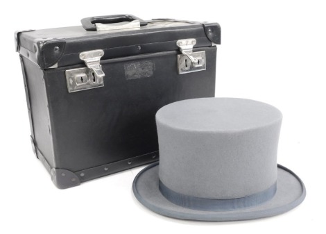 A Wegener gentleman's pale blue top hat, internal measurements 17cm x 20cm, in carry case, with additional carry case. (2)