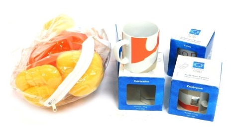 A group of 2004 Olympic Games memorabilia, comprising 2004 Athens George character, and four mugs, boxed. (1 box)