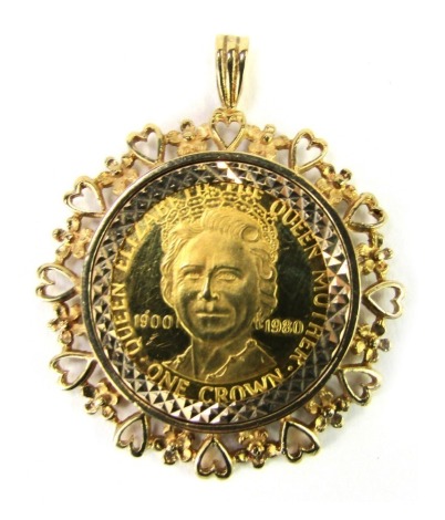 An Isle of Man gold one crown 1980, spectacle set to a 9ct gold pendant mount, 9.8g all in.