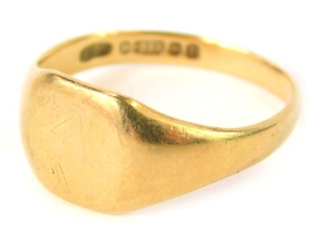 A 9ct gold signet ring, the square ring head of plain design on a plain band, Birmingham 1953, ring size R½, 3.6g all in.