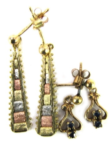 Two pairs of 9ct gold earrings, comprising a pair of sapphire and 9ct gold drops, 1.5cm high, and a pair of 9ct gold tri-colour earrings, on single pin with butterfly backs, 375, 3cm high, 3.4g all in.