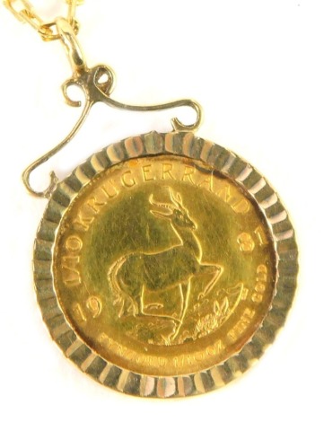 A one tenth of a Krugerrand gold coin pendant and chain, the coin dated 1981, in 9ct gold mount, on a box link neck chain, yellow metal stamped 9kt, 52cm long, 8.1g all in.