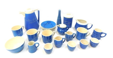 A group of Forster's and other pottery commemorative wares, for the Isle of Skye, Ilfracombe, Isle of Wight, Matlock Bath, etc, on a cream and blue ground, to include coffee pot, milk jug, sugar bowl, four egg cups, four cups, salt, etc. (1 tray)