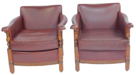 Two 1930s lounge chairs, upholstered in red leatherette fabric, with stud work. The upholstery in this lot does not comply with the 1988 (Fire & Fire Furnishing) Regulations, unless sold to a known exporter or upholsterer it will be cut from the frame be