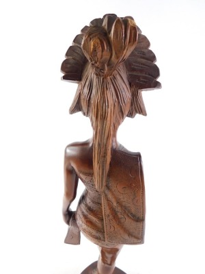 A Balinese hardwood carving of a female figure, 51cm high. - 2