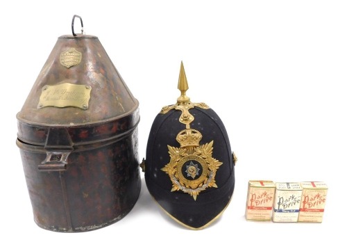 A 19thC Worcestershire regimental helmet, with crest and gilt metal spike, in original tin box, engraved Captain JM Graham with some provenance.