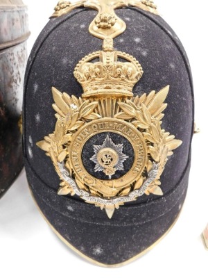 A 19thC Worcestershire regimental helmet, with crest and gilt metal spike, in original tin box, engraved Captain JM Graham with some provenance. - 3