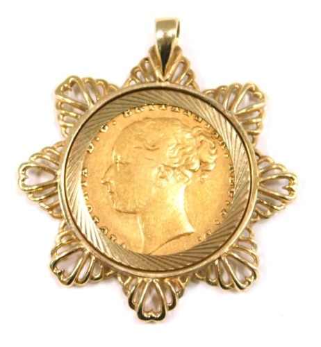 A young Victoria head full gold sovereign pendant, dated 1876, in a 9ct gold star mount, 12.3g all in.