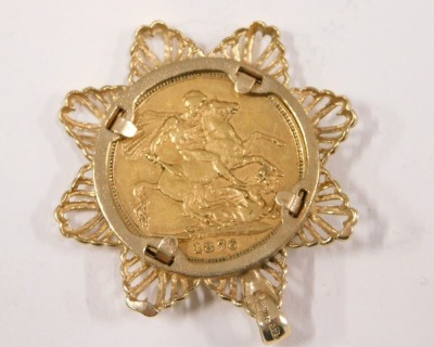 A young Victoria head full gold sovereign pendant, dated 1876, in a 9ct gold star mount, 12.3g all in. - 2