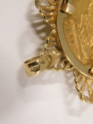 A young Victoria head full gold sovereign pendant, dated 1876, in a 9ct gold star mount, 12.3g all in. - 3