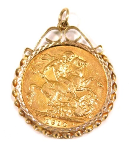 An Edward VII full gold sovereign pendant, dated 1910, in a 9ct gold twist work pendant mount, 9.1g all in.