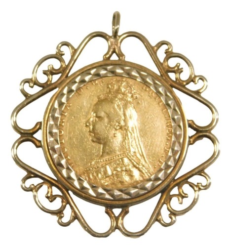 A Victorian full gold sovereign, dated 1891, in a 9ct gold scroll work pendant mount, 11.7g.