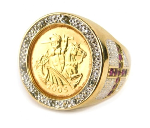 A Queen Elizabeth II St George half gold sovereign ring, the sovereign dated 2005 with warrior on horseback, in a 9ct gold ring mount, set with diamonds to rim and diamonds and rubies to shoulders, formed as the England flag, ring size X½, 10g all in.