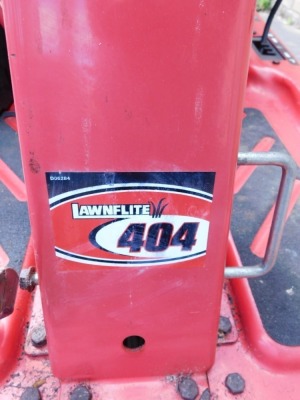 A Lawnflite 404 petrol ride on mower, in red. - 3