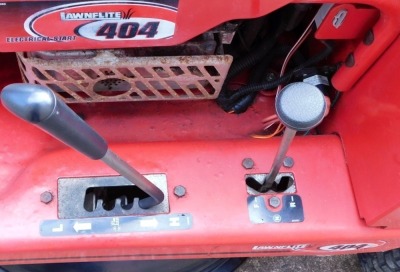 A Lawnflite 404 petrol ride on mower, in red. - 4