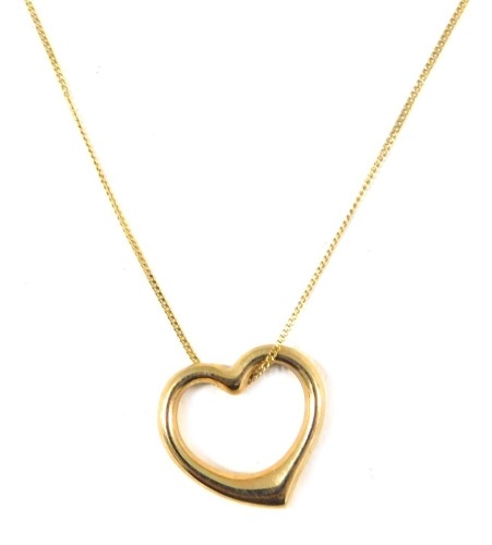 A 9ct gold heart shaped pendant and chain, the hollow heart 2cm high, on a fine link neck chain, 44cm long, 1.2g all in, boxed. (AF)